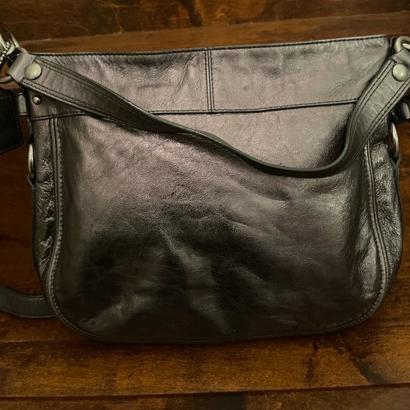 Leather Coach crossbody purse in a pewter color. - Picture 2 of 8
